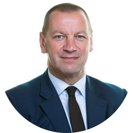 Man in suit behind white background